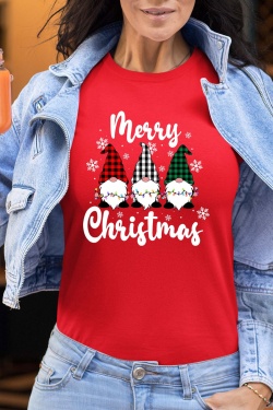 Woman wearing a denim jacket over a Christmas graphic tee